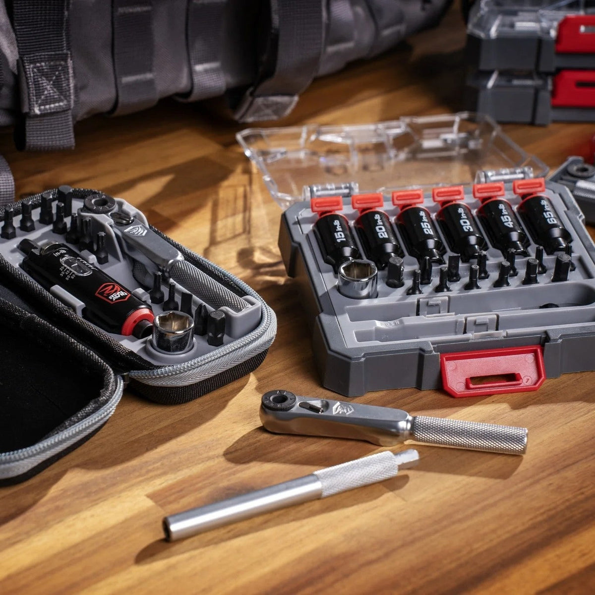 Real Avid gunsmithing torque wrench and bit set displayed on workbench — precision gun maintenance tools for scope and firearm setup.